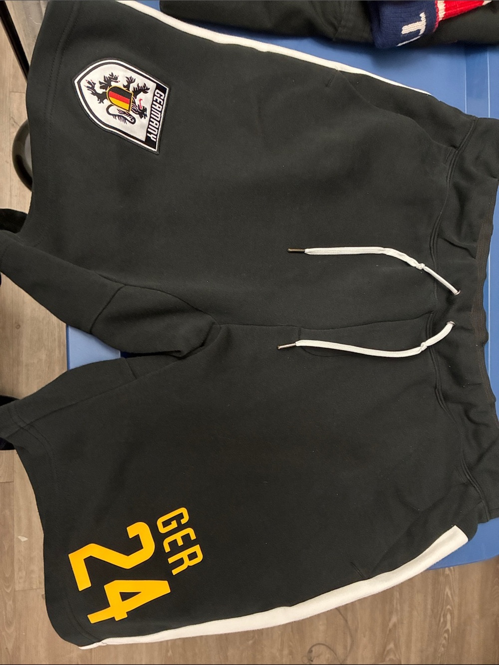Black Athletic Shorts with Yellow Team Graphic